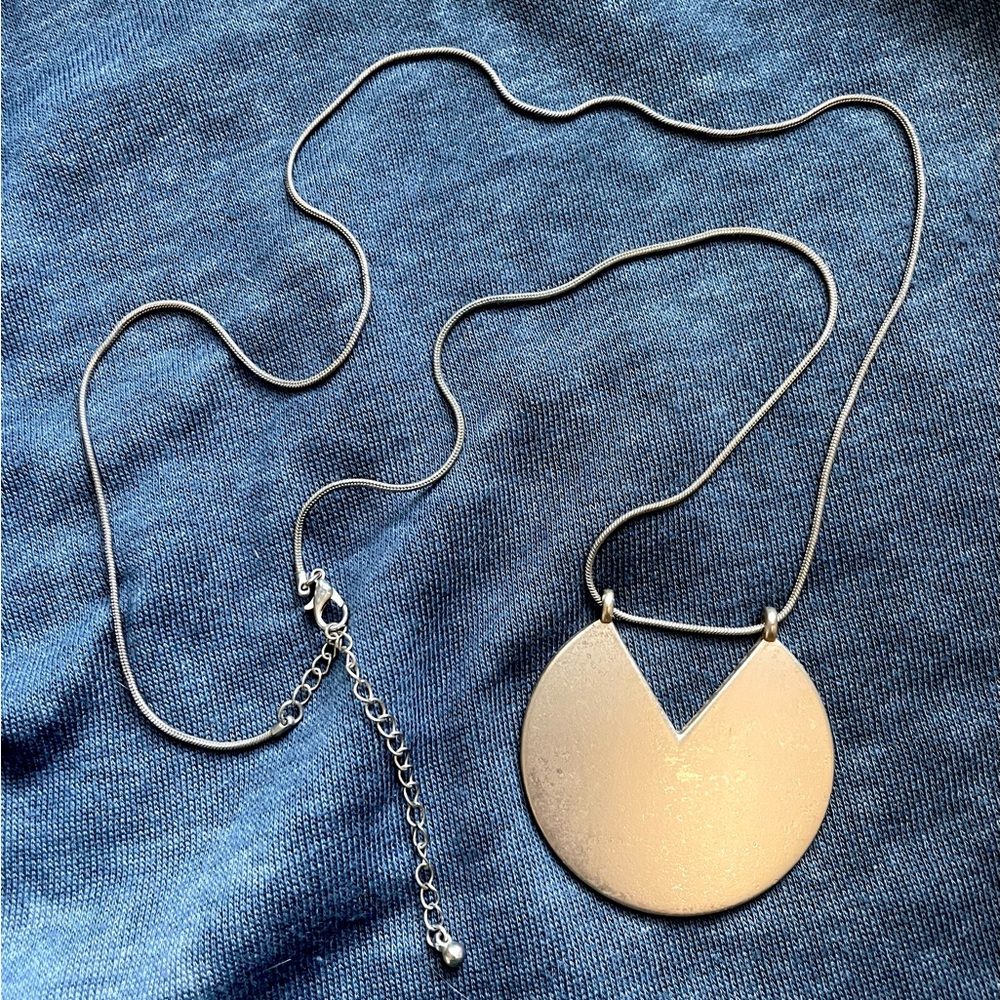 Gold statement necklace Bold but minimalistic pendant.